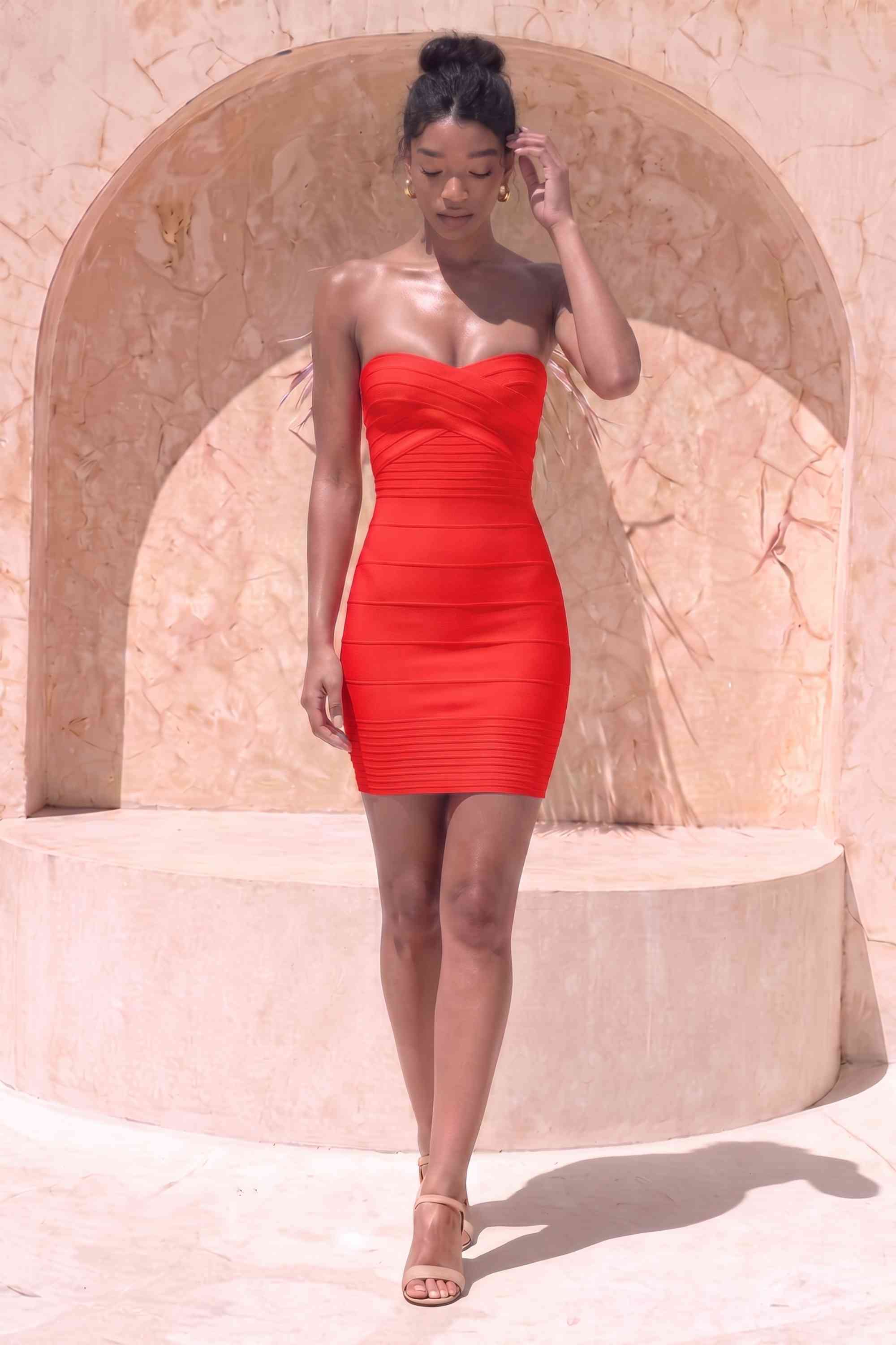 Woman wearing a figure flattering Aaliyah Bandage Mini Dress - Lipstick Red BODYCON COLLECTION