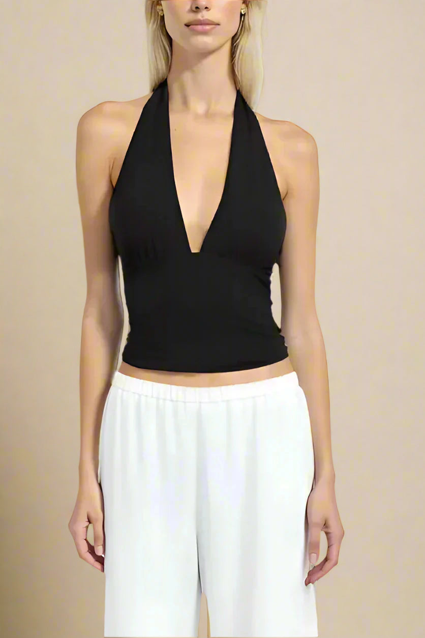 Woman wearing a figure flattering Aby Bodycon Top - Classic Black BODYCON COLLECTION Pty Ltd