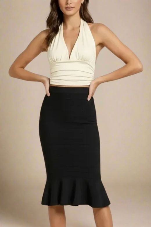 Woman wearing a figure flattering Aby Halter Top - Butter Yellow BODYCON COLLECTION Pty Ltd