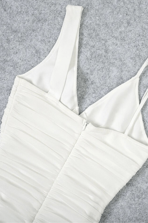 Woman wearing a figure flattering Adele Bodycon Wrap Midi Dress - Pearl White BODYCON COLLECTION