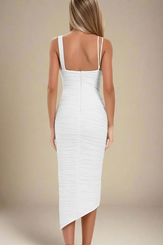 Woman wearing a figure flattering Adele Bodycon Wrap Midi Dress - Pearl White BODYCON COLLECTION