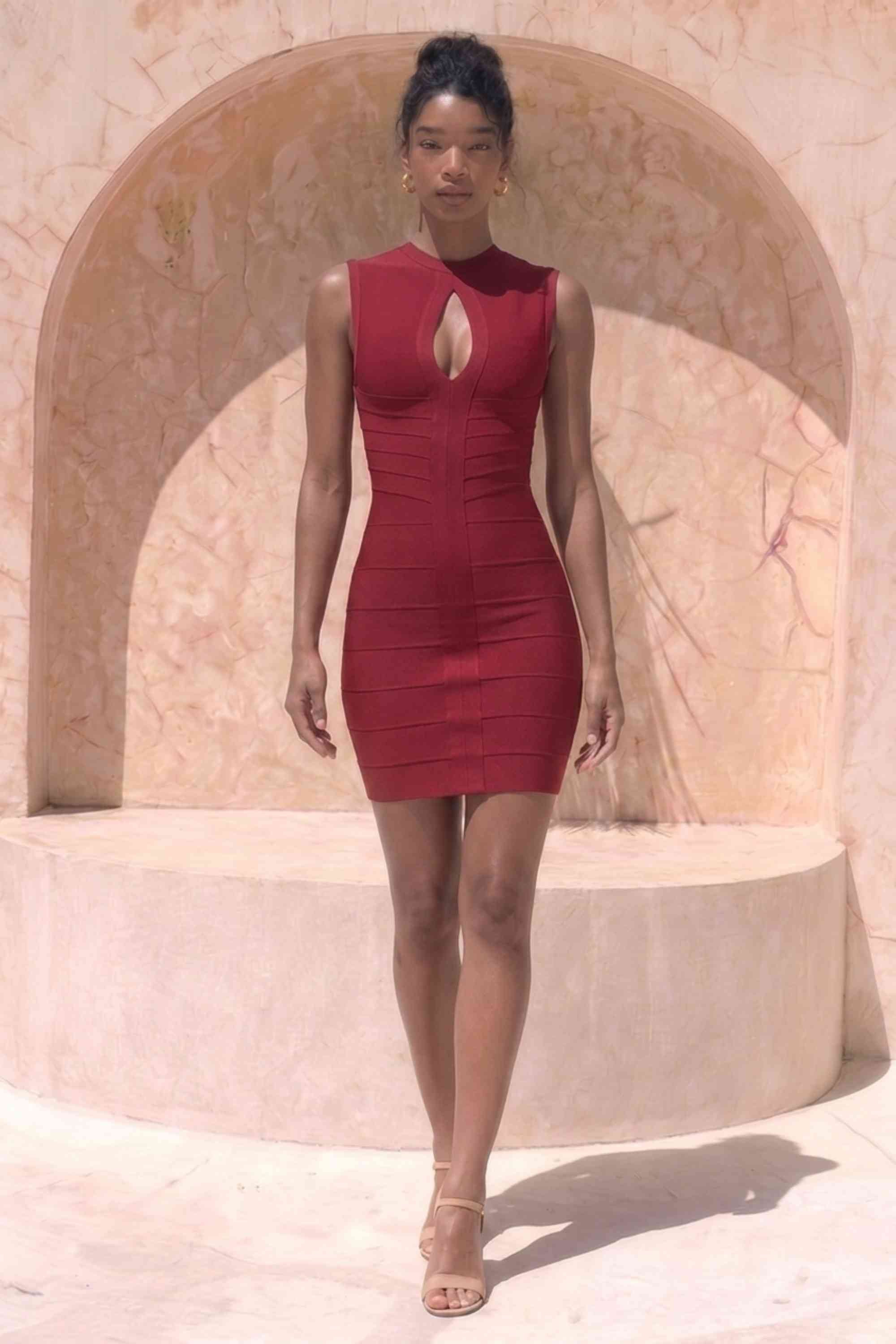 Woman wearing a figure flattering Alora Bandage Mini Dress - Red Wine BODYCON COLLECTION Pty Ltd