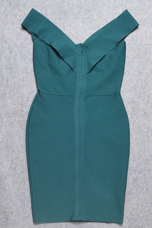 Woman wearing a figure flattering Ash Bandage Dress - Emerald Green Bodycon Collection