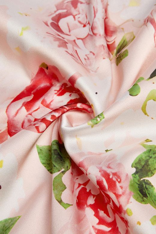 Woman wearing a figure flattering Astrid Bodycon Maxi Dress - Dusty Pink BODYCON COLLECTION