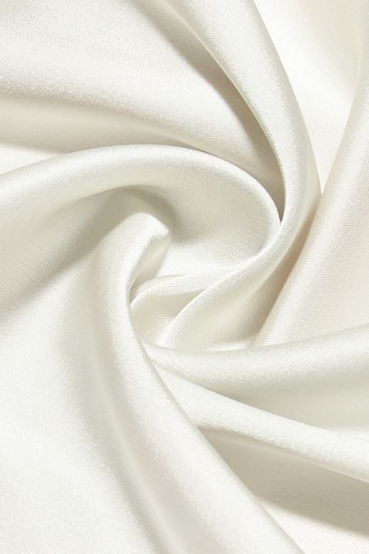 Woman wearing a figure flattering Astrid Bodycon Maxi Dress - Pearl White BODYCON COLLECTION