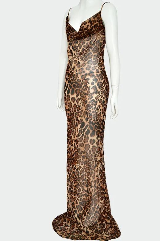 Woman wearing a figure flattering Athena Bodycon Maxi Dress - Leopard Print Yellow BODYCON COLLECTION