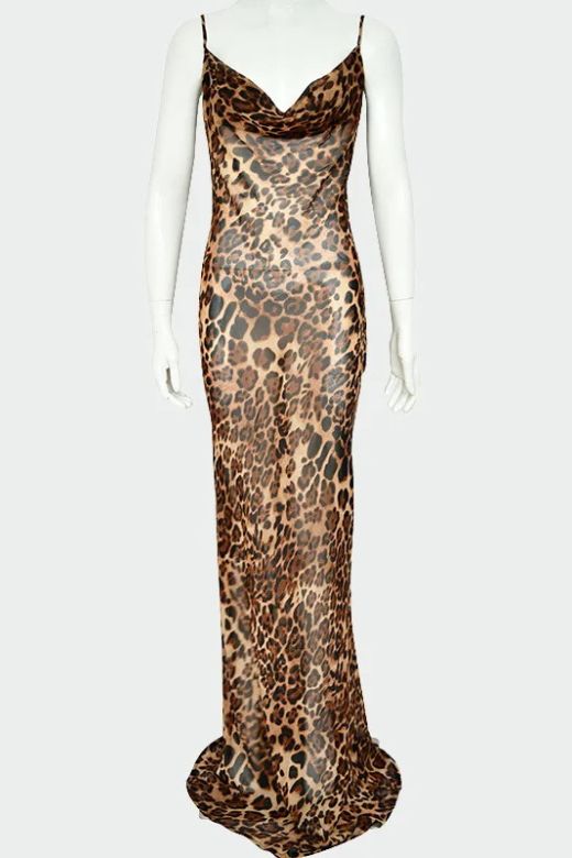 Woman wearing a figure flattering Athena Bodycon Maxi Dress - Leopard Print Yellow BODYCON COLLECTION