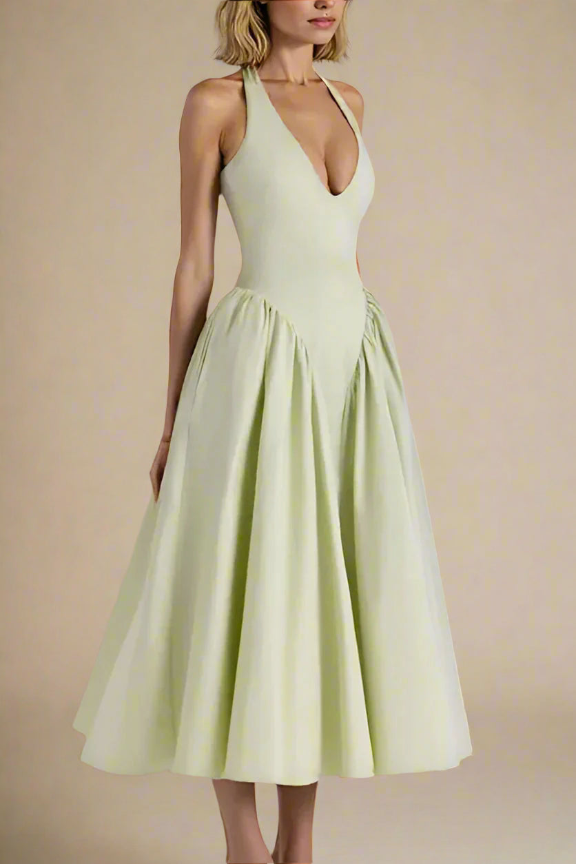 Woman wearing a figure flattering Austen Bodycon Midi Dress - Pistachio Green BODYCON COLLECTION