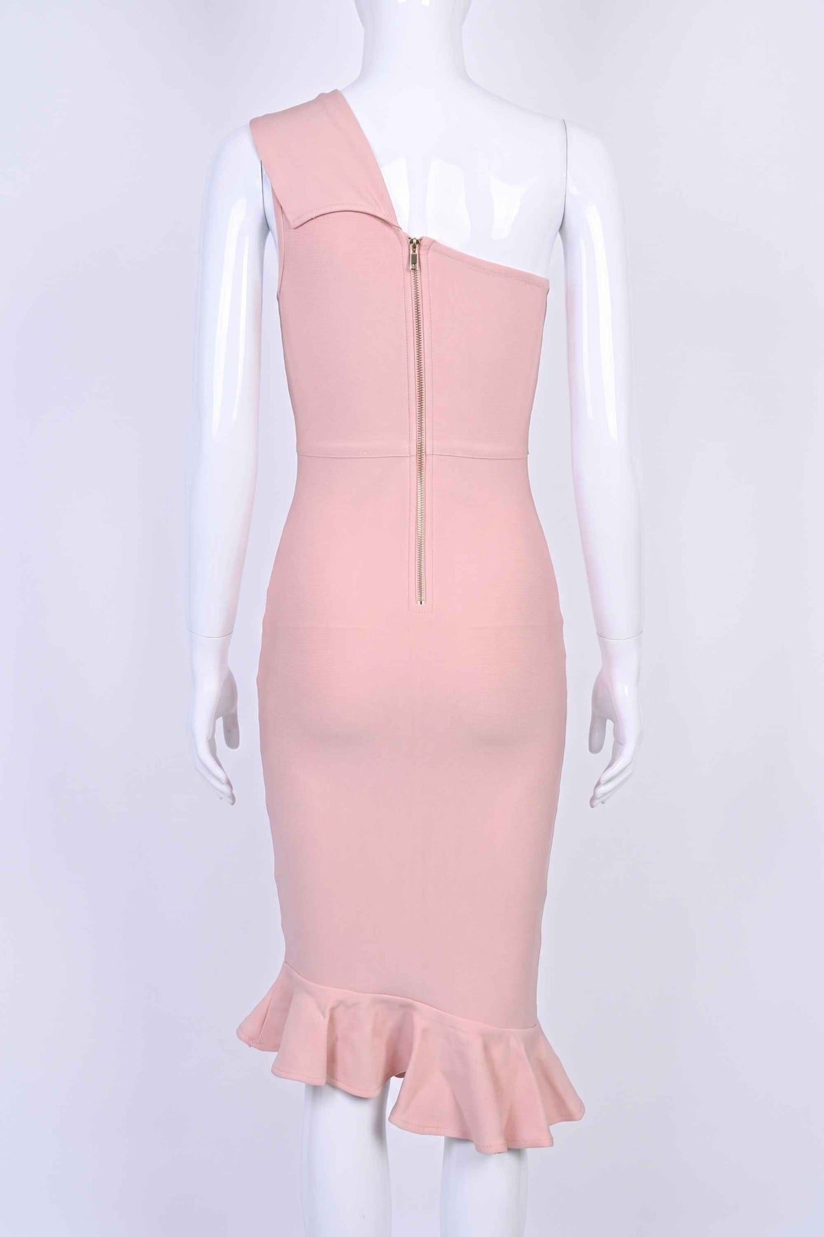 Woman wearing a figure flattering Avery Bandage Dress - Dusty Pink BODYCON COLLECTION