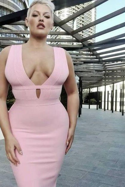 Woman wearing a figure flattering Bay Bandage Dress - Pearl White Bodycon Collection