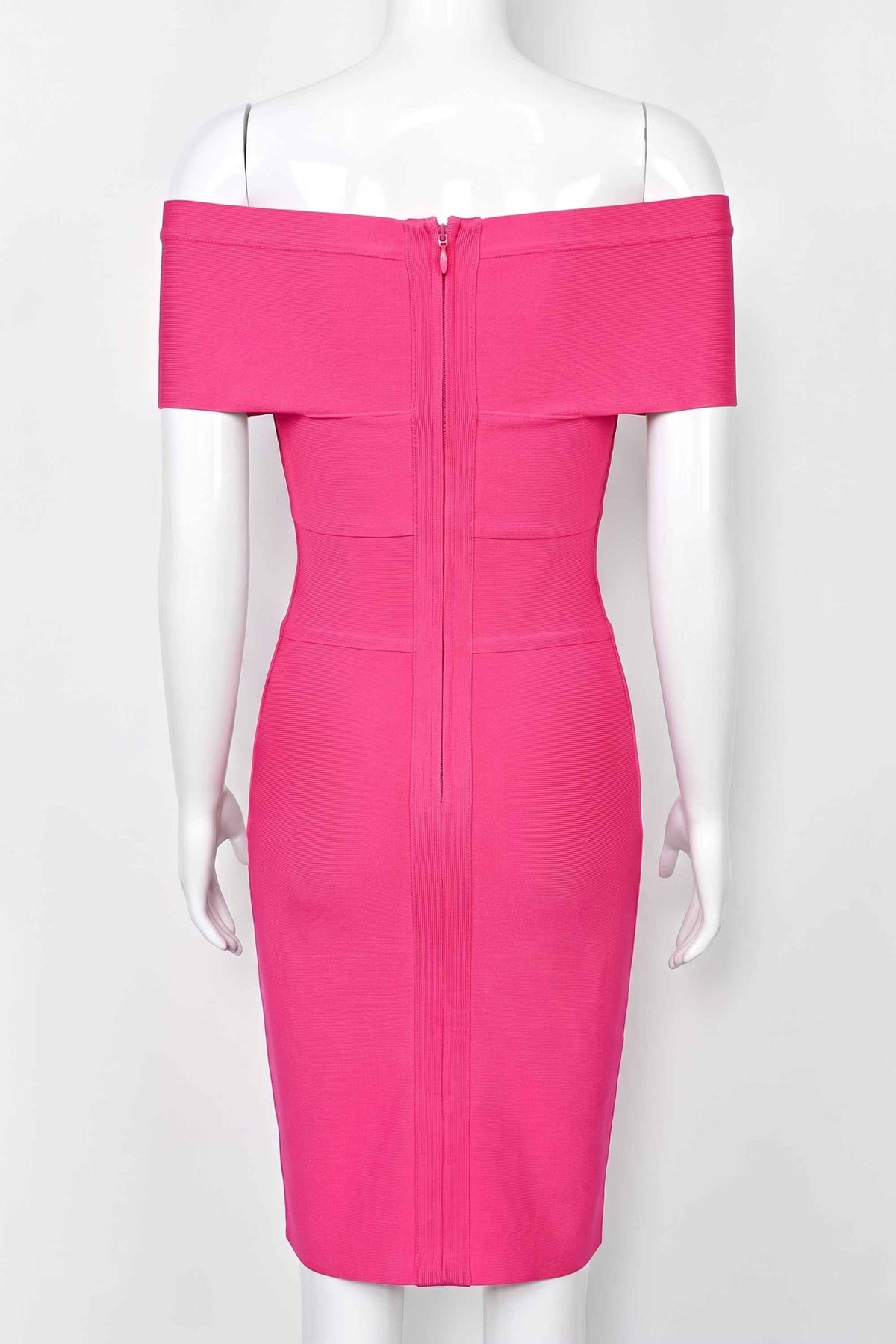 Woman wearing a figure flattering Bea Bandage Dress - Hot Pink Bodycon Collection