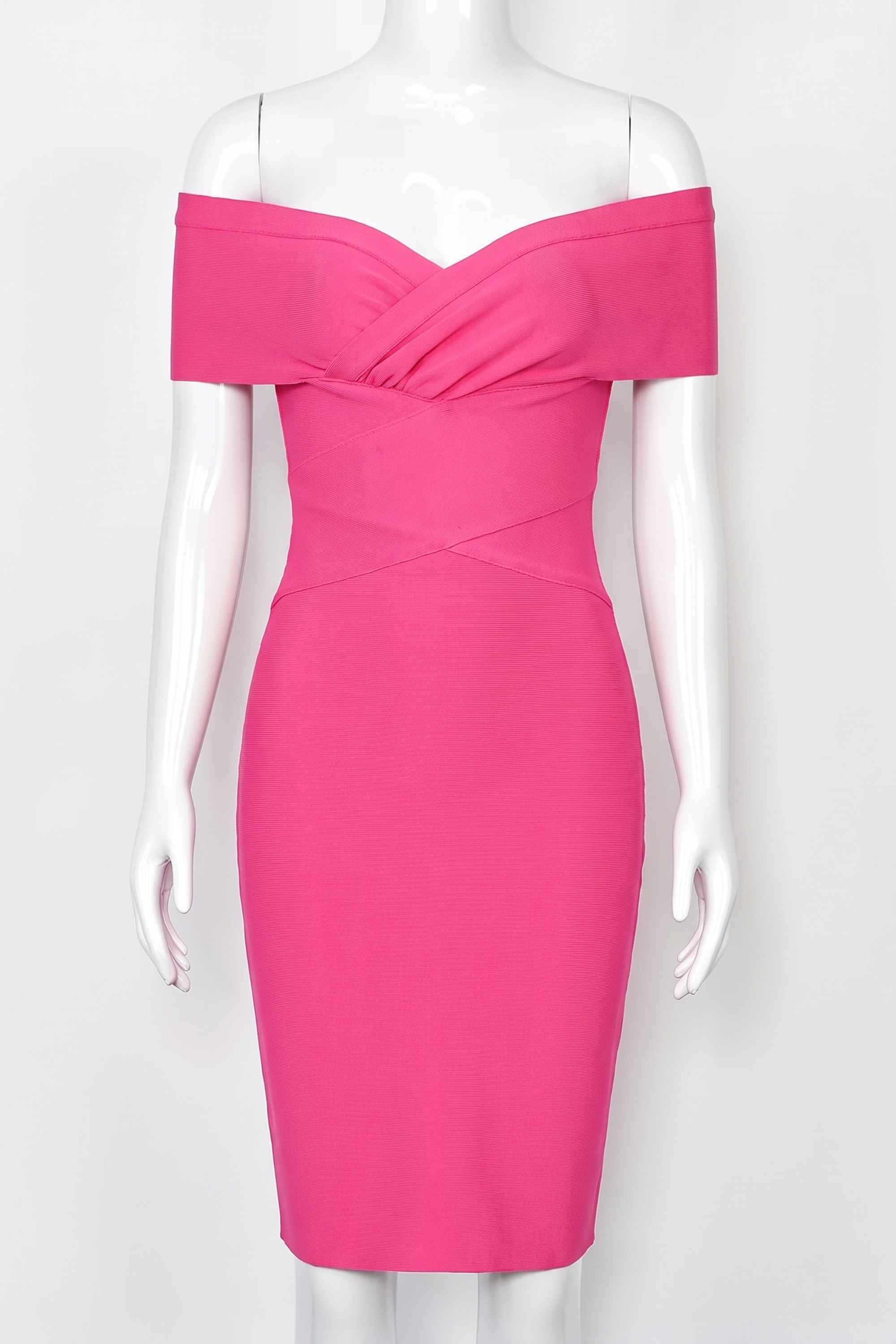 Woman wearing a figure flattering Bea Bandage Dress - Hot Pink Bodycon Collection