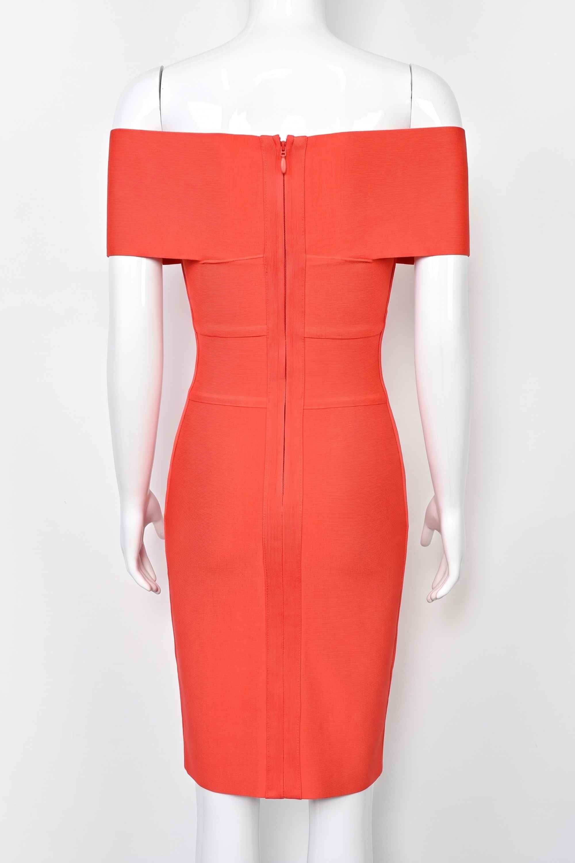 Woman wearing a figure flattering Bea Bandage Dress - Lipstick Red Bodycon Collection