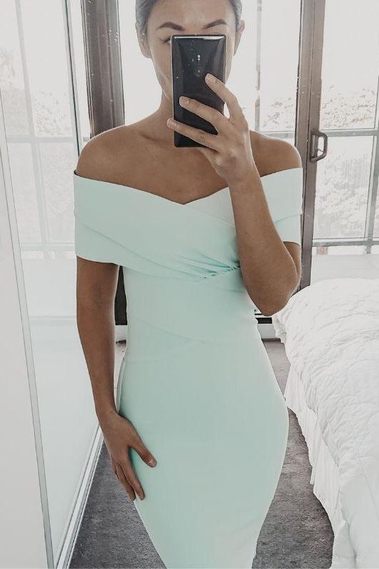 Woman wearing a figure flattering Bea Bandage Dress - Mint Green Bodycon Collection