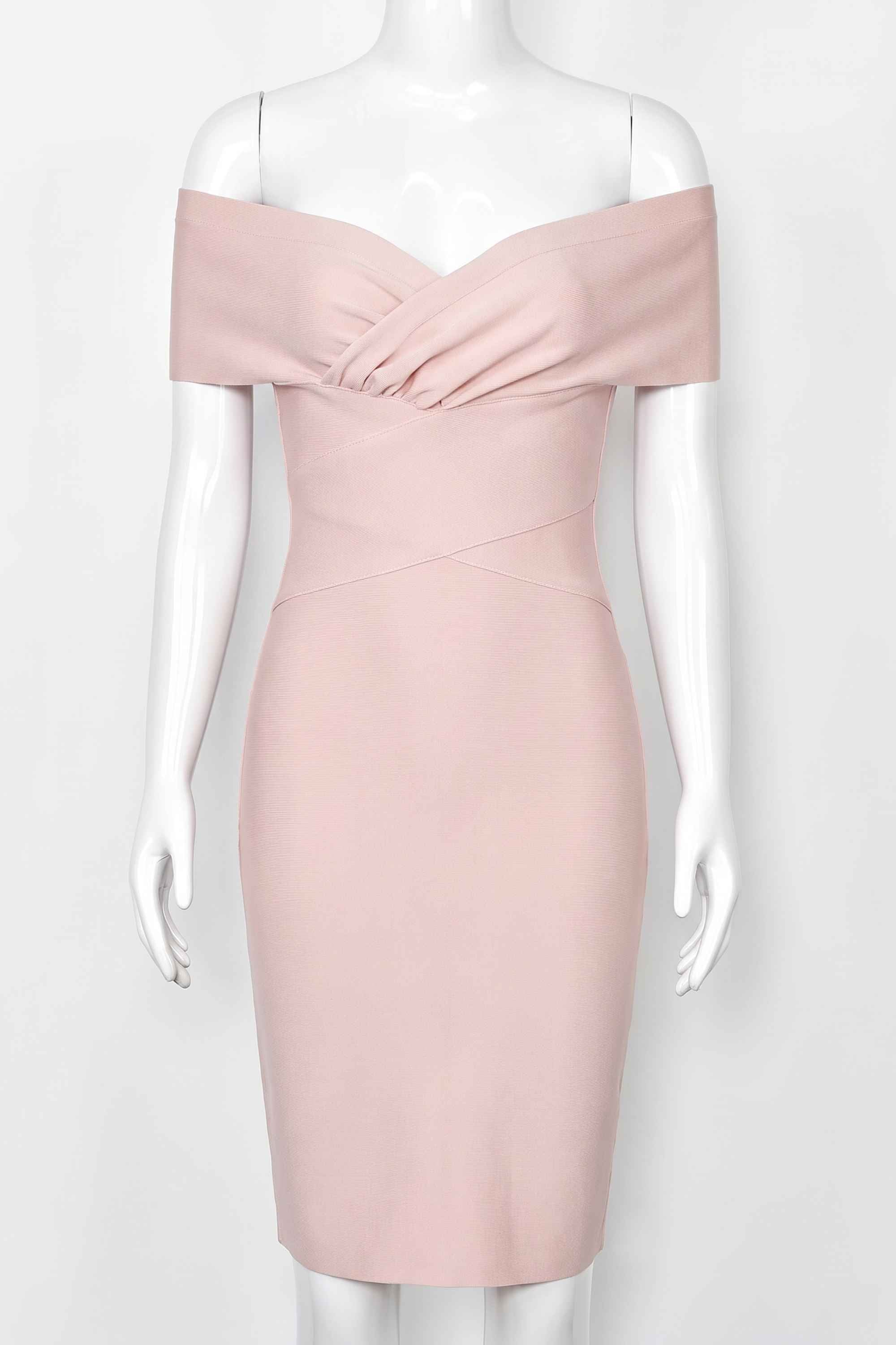 Woman wearing a figure flattering Bea Bandage Dress - Nude Bodycon Collection