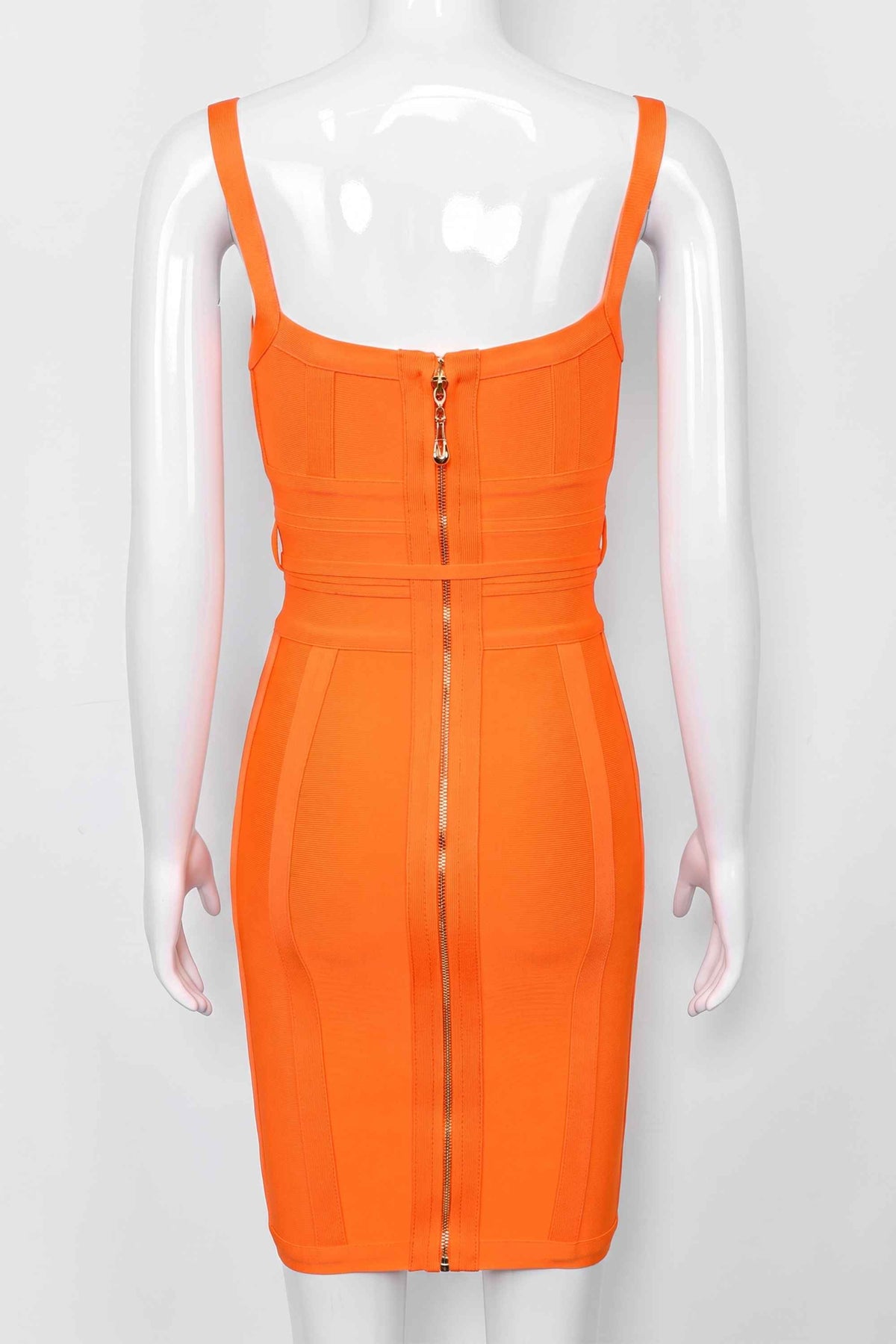 Woman wearing a figure flattering Bek Bandage Dress - Apricot Orange Bodycon Collection