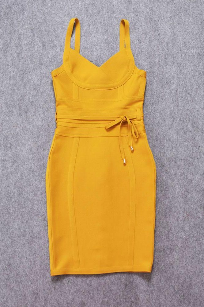 Woman wearing a figure flattering Bek Bandage Dress - Mustard Yellow Bodycon Collection