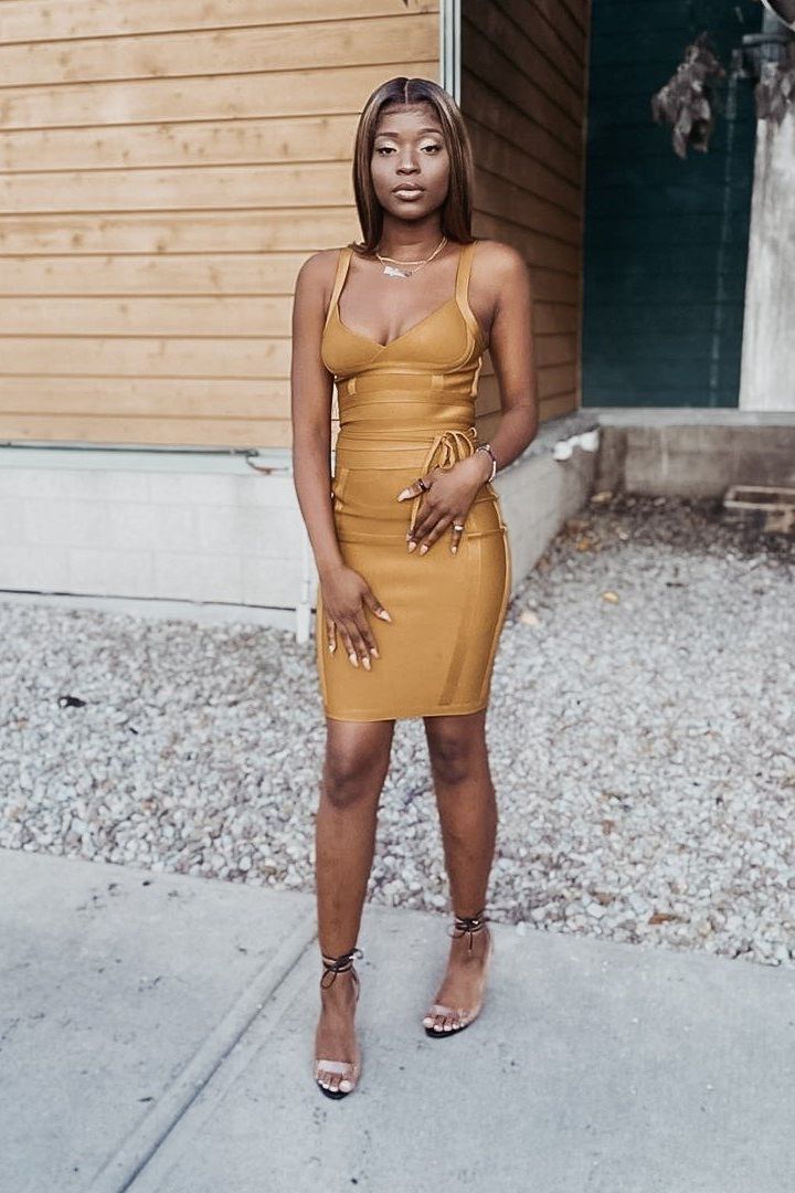 Woman wearing a figure flattering Bek Bandage Dress - Sky Blue Bodycon Collection