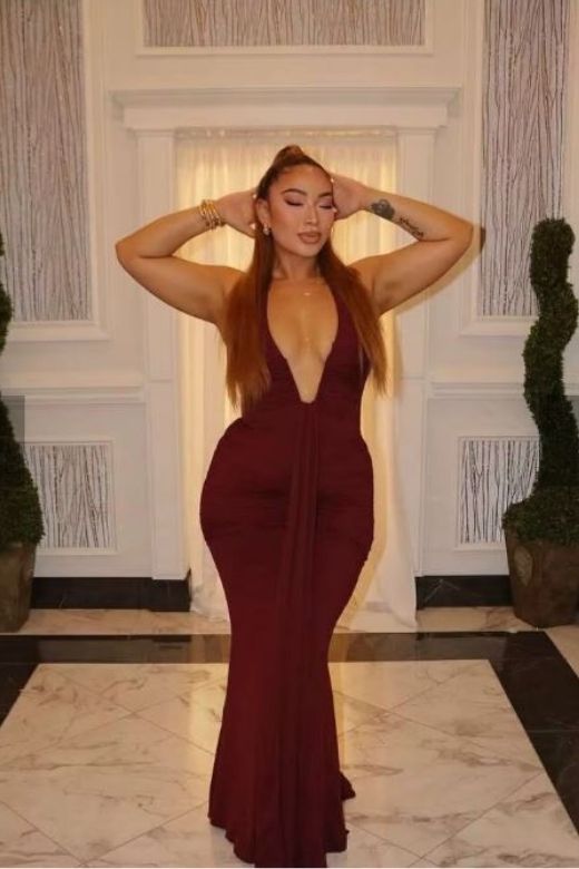 Woman wearing a figure flattering Bella Bodycon Wrap Maxi Dress - White Pearl BODYCON COLLECTION Pty Ltd