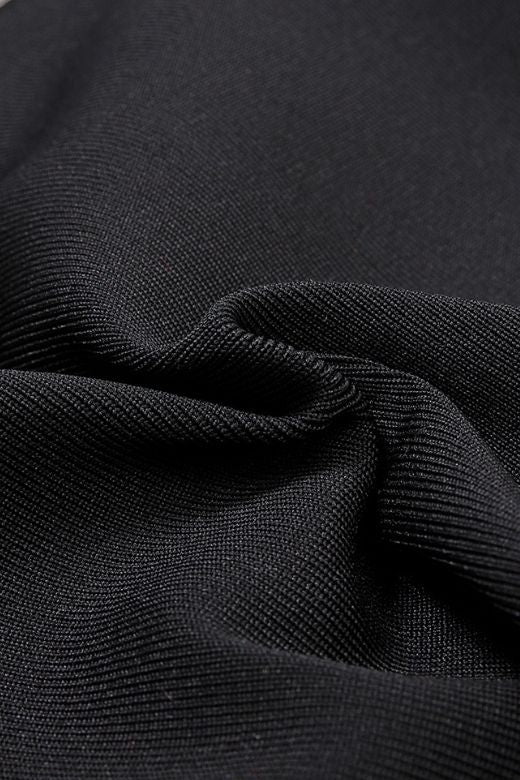 Woman wearing a figure flattering Beth Bandage Dress - Classic Black BODYCON COLLECTION