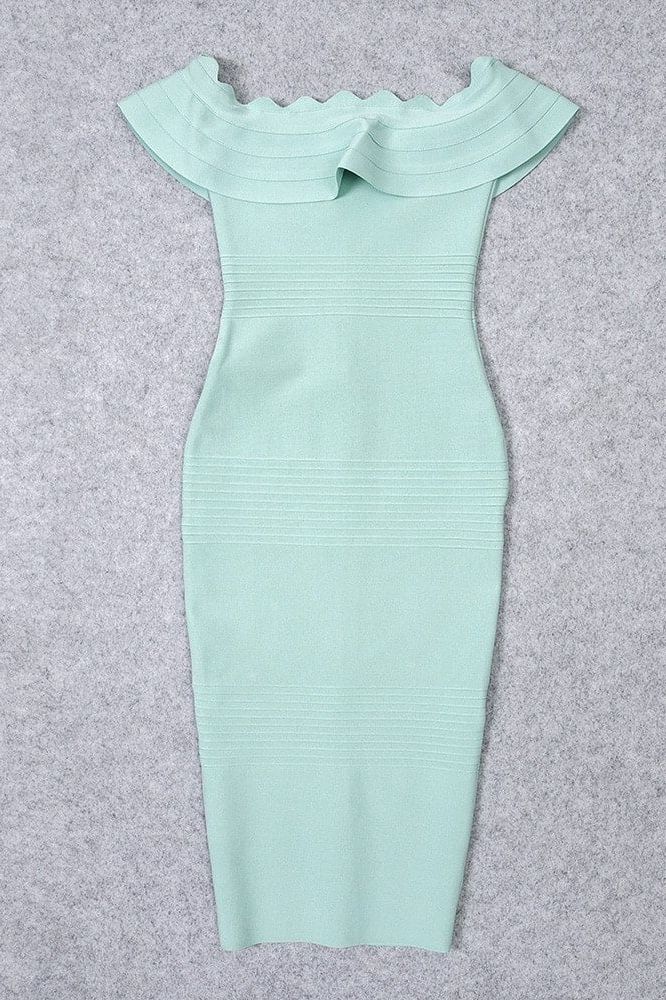 Woman wearing a figure flattering Billie Bandage Midi Dress - Mint Green Bodycon Collection