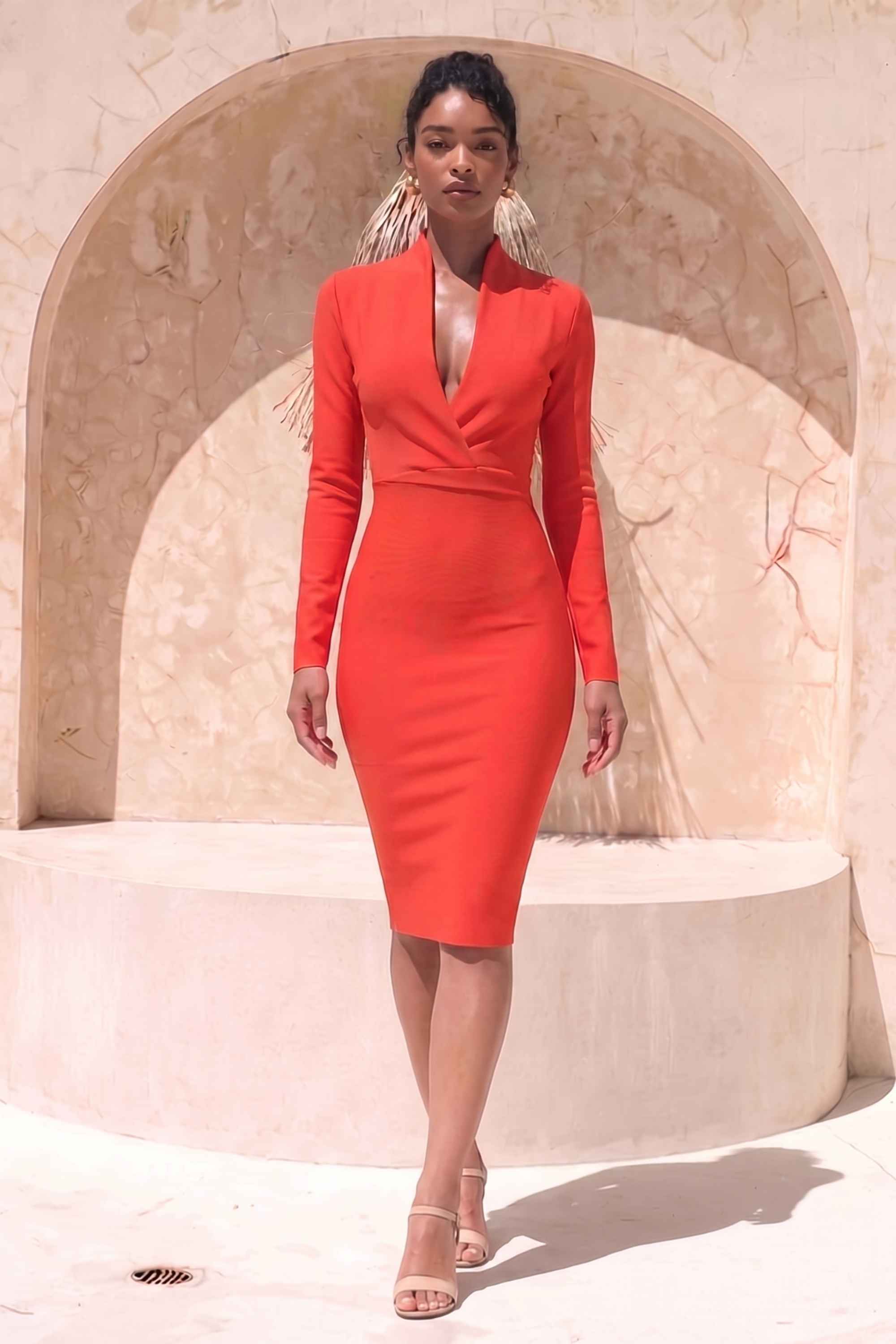 Woman wearing a figure flattering Blaire Long Sleeve Bandage Dress - Lipstick Red BODYCON COLLECTION