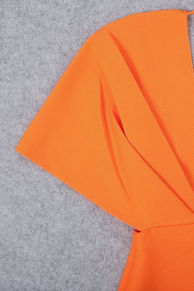 Woman wearing a figure flattering Blake Bandage Maxi Dress - Apricot Orange BODYCON COLLECTION