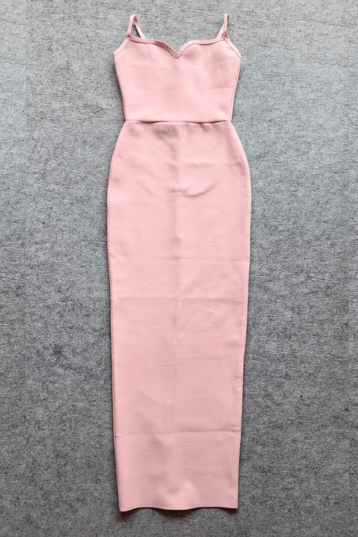 Woman wearing a figure flattering Blanche Bandage Maxi Dress - Dusty Pink BODYCON COLLECTION