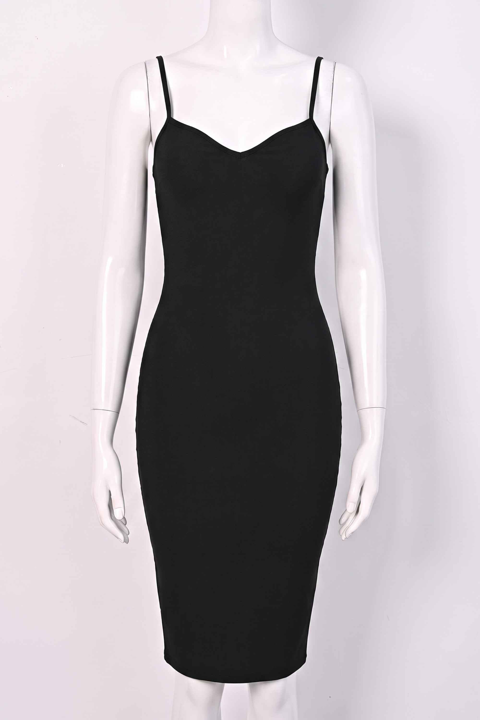 Woman wearing a figure flattering Blanche Bandage Midi Dress - Classic Black BODYCON COLLECTION