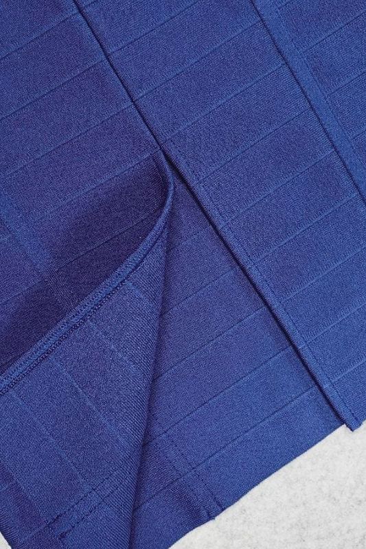 Woman wearing a figure flattering  Breanna Bandage Dress - Navy Blue BODYCON COLLECTION