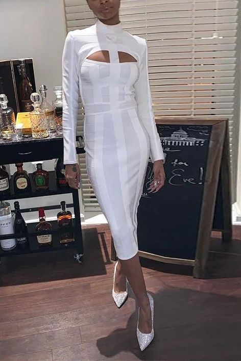 Woman wearing a figure flattering Brooke Long Sleeve Bandage Dress - Lipstick Red BODYCON COLLECTION