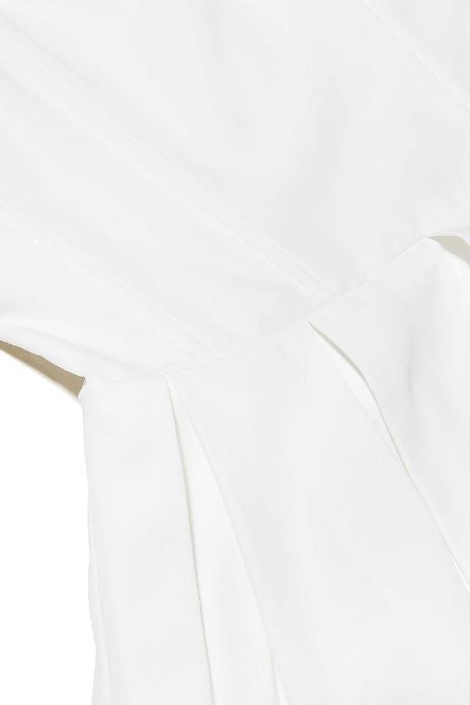 Woman wearing a figure flattering Capri Bodycon Strapless Mini Dress - Pearl White BODYCON COLLECTION