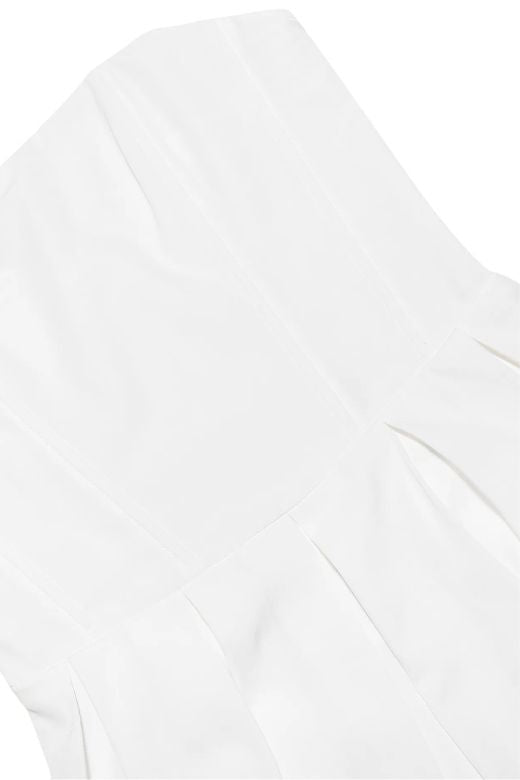 Woman wearing a figure flattering Capri Bodycon Strapless Mini Dress - Pearl White BODYCON COLLECTION
