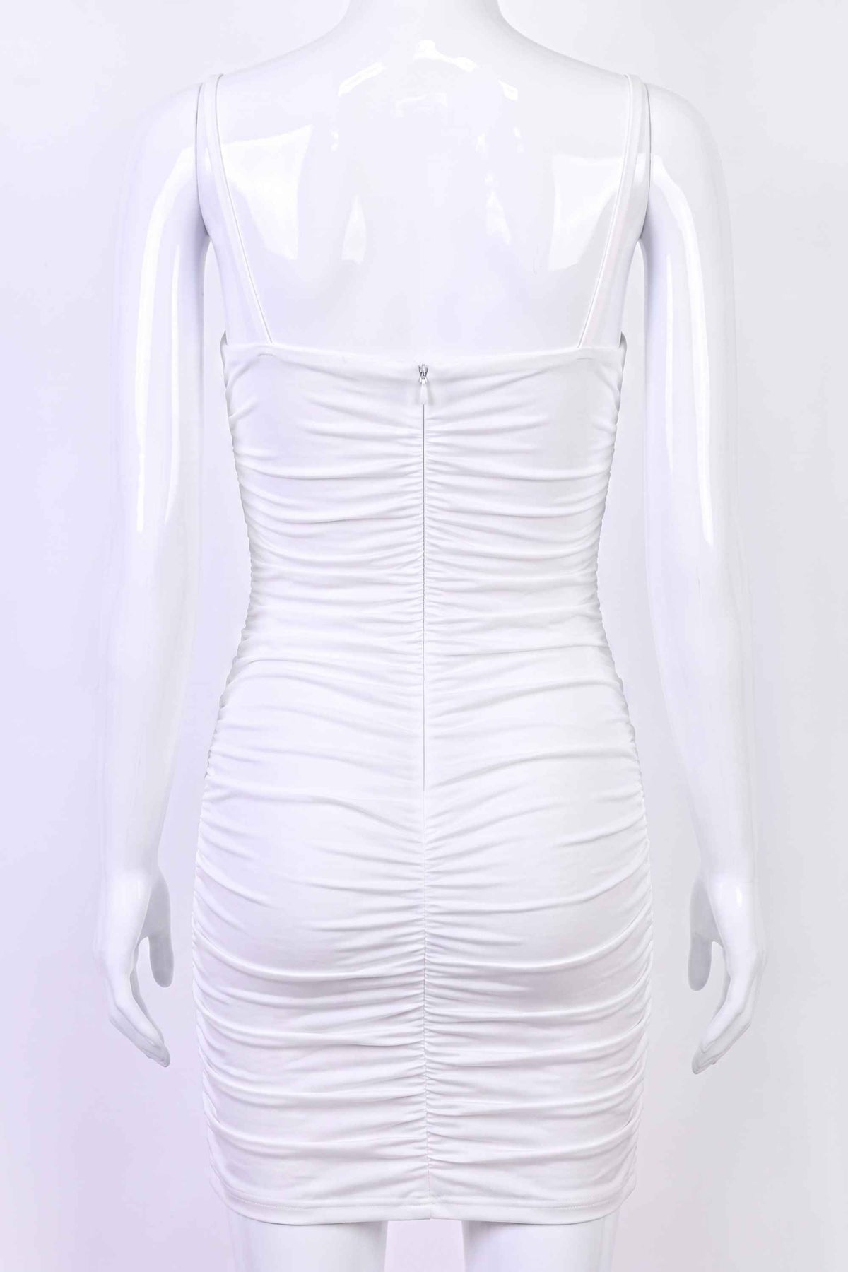 Woman wearing a figure flattering Cassie Bodycon Wrap Mini Dress - Pearl White BODYCON COLLECTION