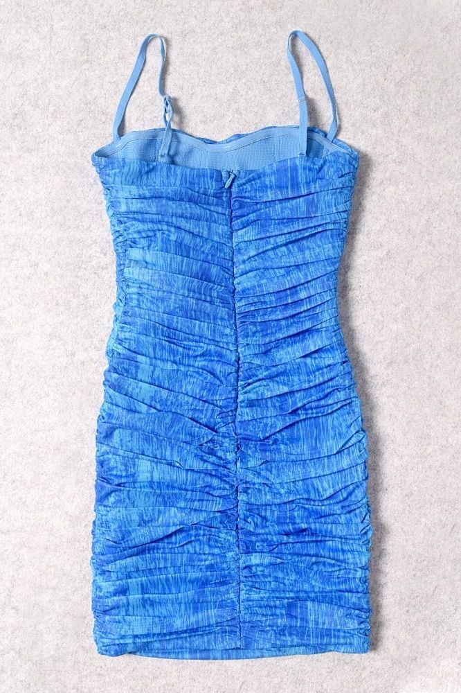 Woman wearing a figure flattering Cassie Bodycon Wrap Mini Dress - Royal Blue BODYCON COLLECTION