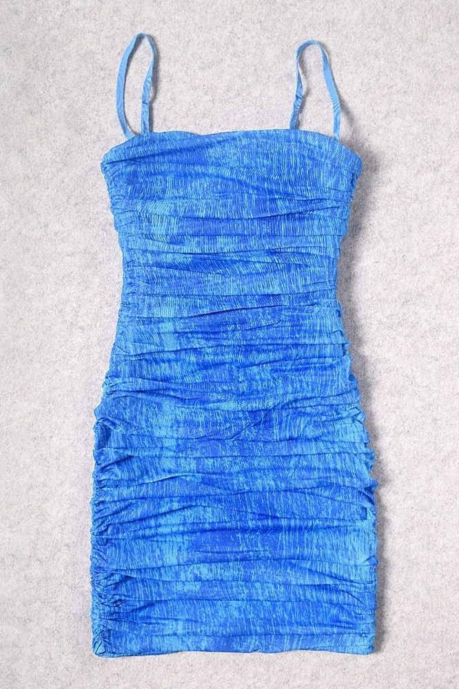 Woman wearing a figure flattering Cassie Bodycon Wrap Mini Dress - Royal Blue BODYCON COLLECTION