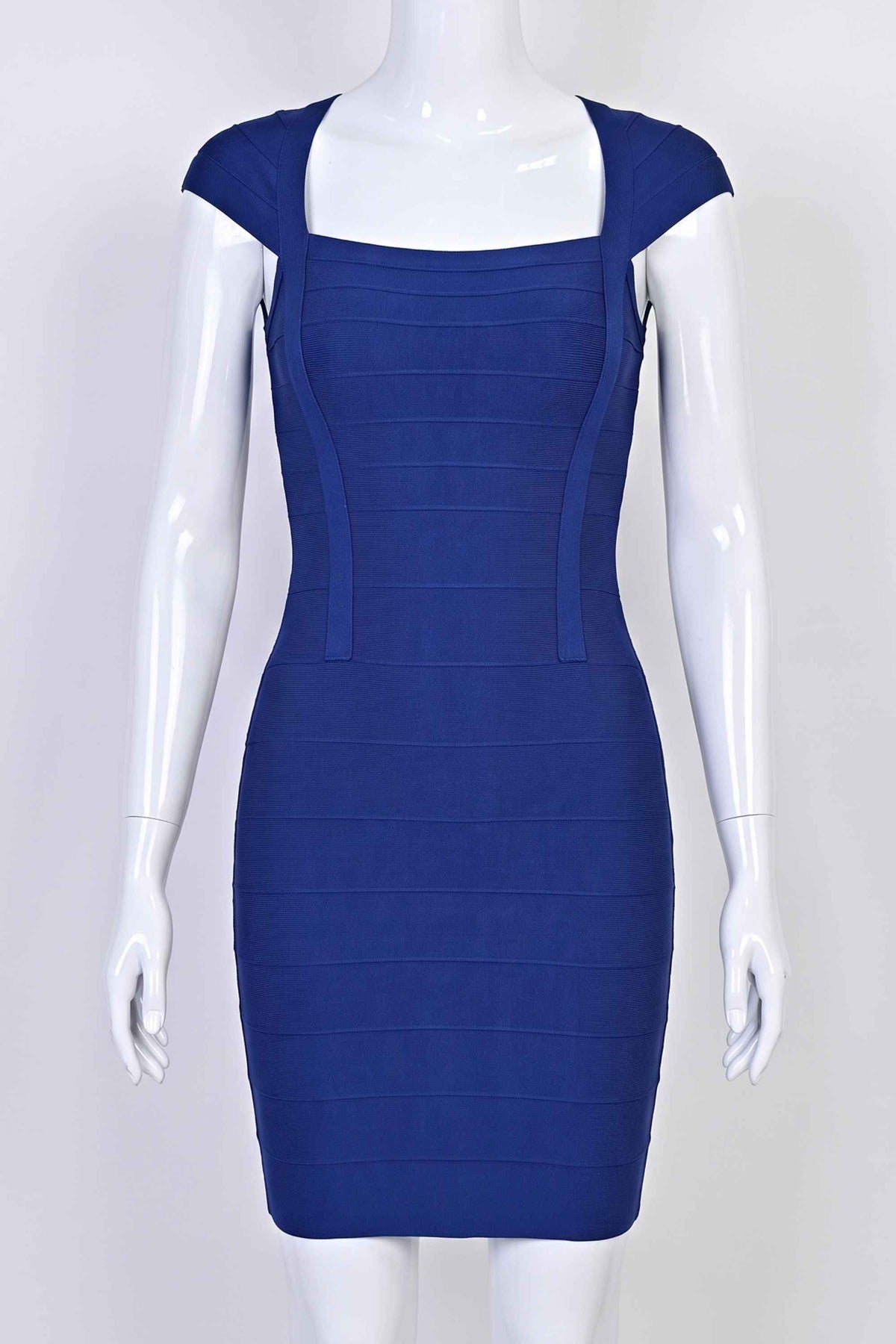 Woman wearing a figure flattering Celine Bandage Mini Dress - Navy Blue BODYCON COLLECTION Pty Ltd