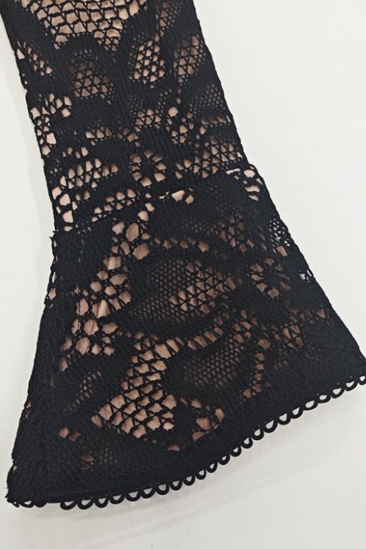 Woman wearing a figure flattering Charlotte Long Sleeve Bodycon Mini Dress - Classic Black BODYCON COLLECTION