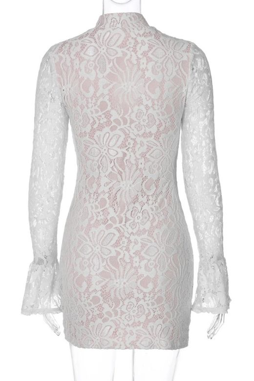 Woman wearing a figure flattering Charlotte Long Sleeve Bodycon Mini Dress - White Pearl BODYCON COLLECTION