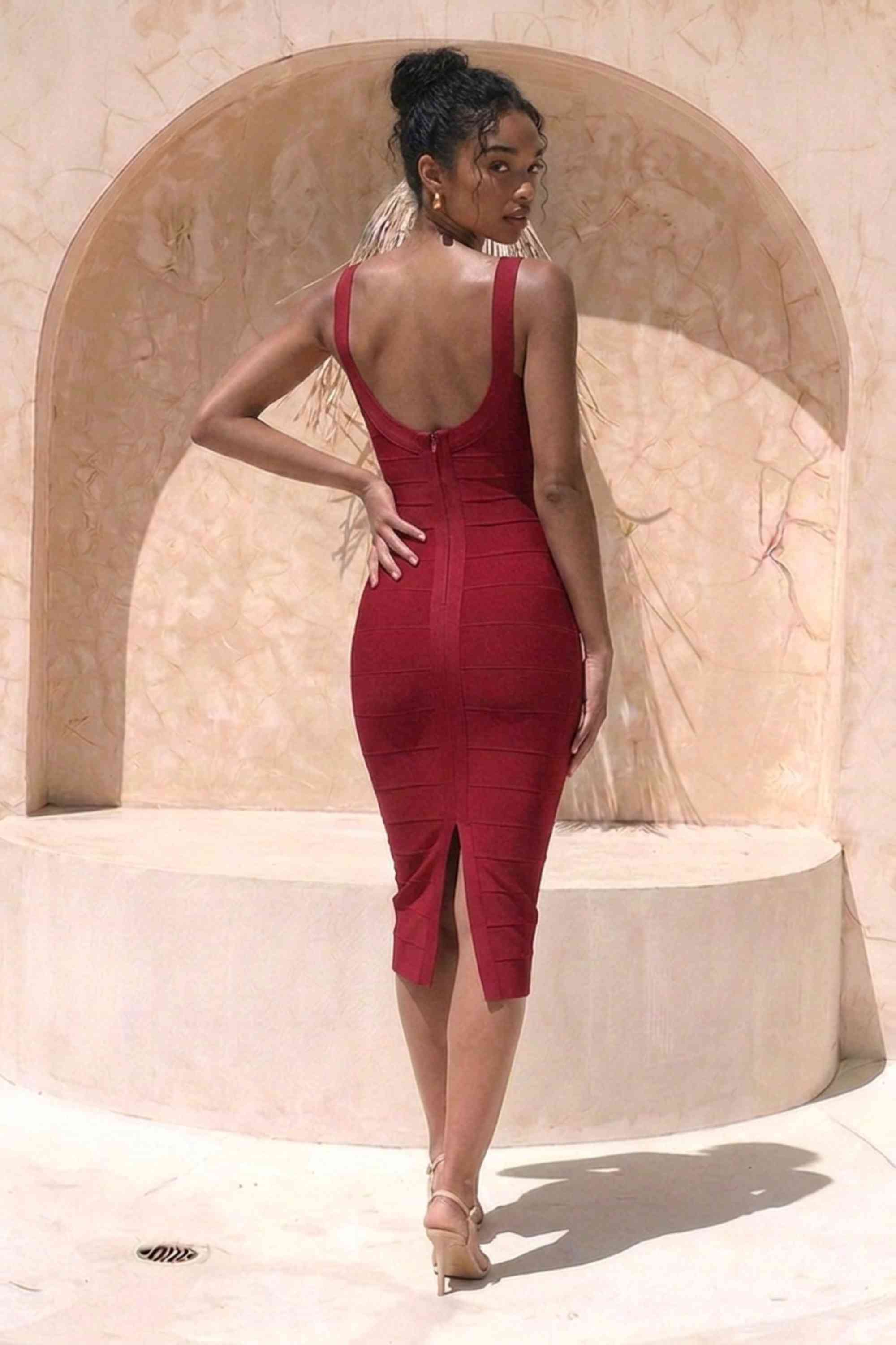 Woman wearing a figure flattering Cindy Bandage Midi Dress - Red Wine BODYCON COLLECTION Pty Ltd