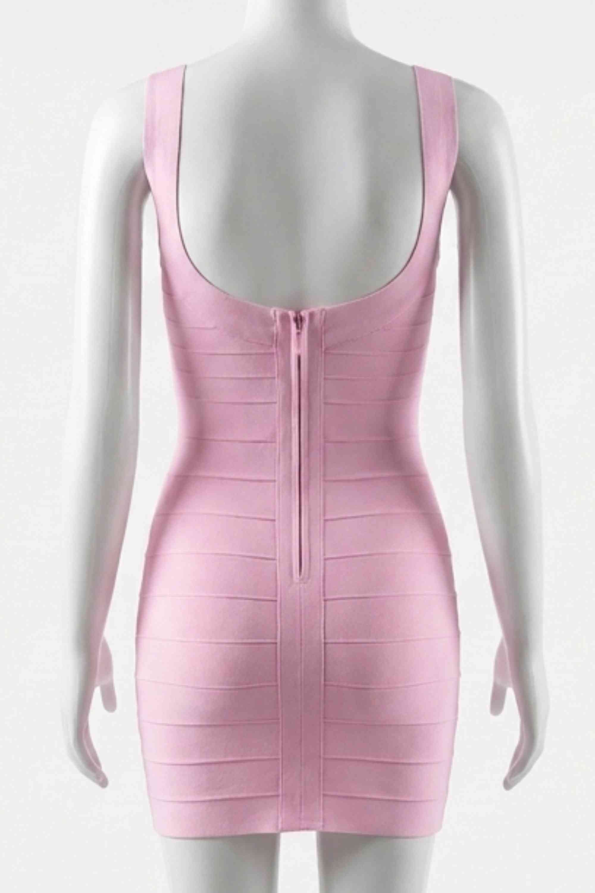 Woman wearing a figure flattering Cindy Bandage Mini Dress - Dusty Pink BODYCON COLLECTION Pty Ltd
