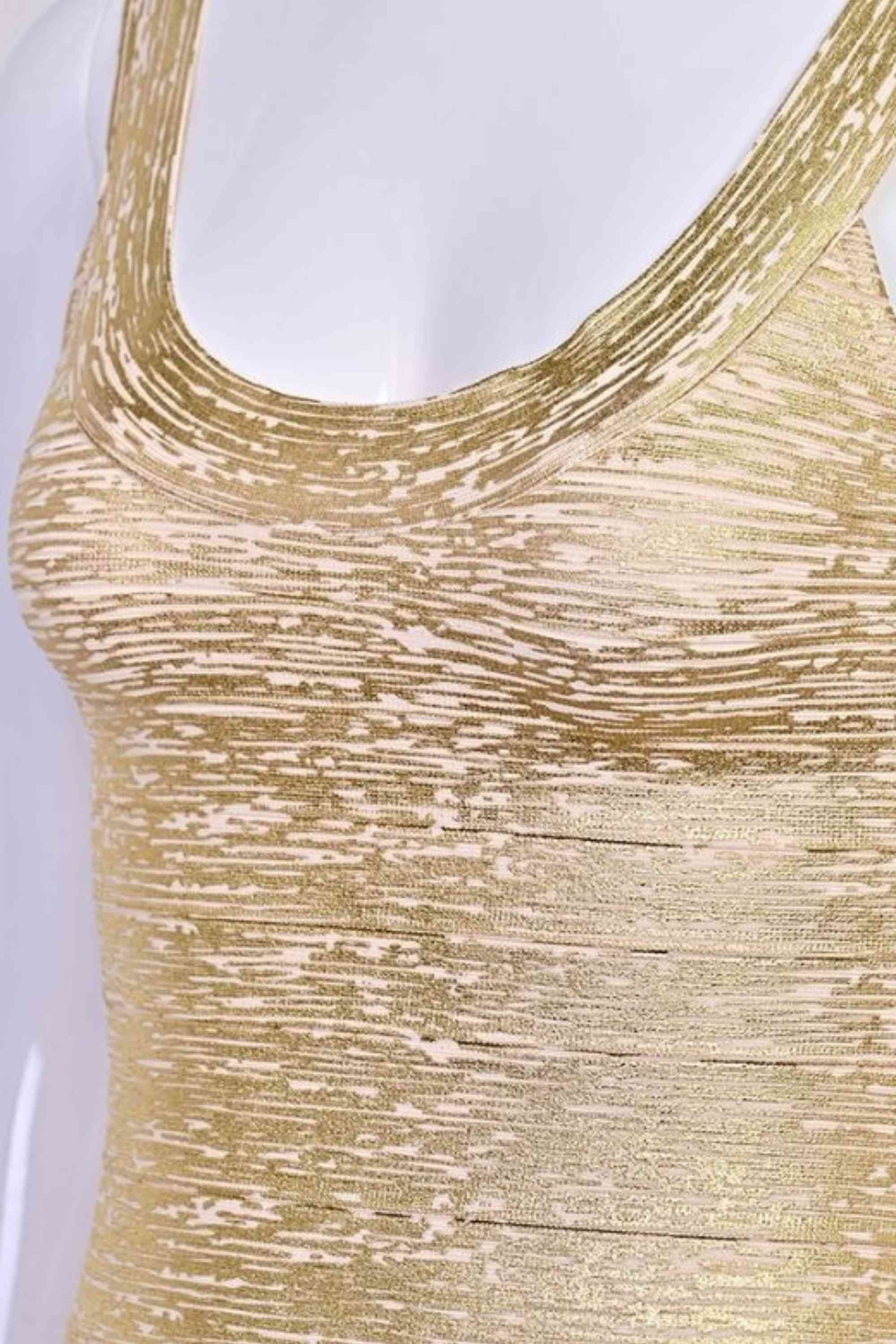 Woman wearing a figure flattering Cindy Bandage Mini Dress - Gold BODYCON COLLECTION Pty Ltd