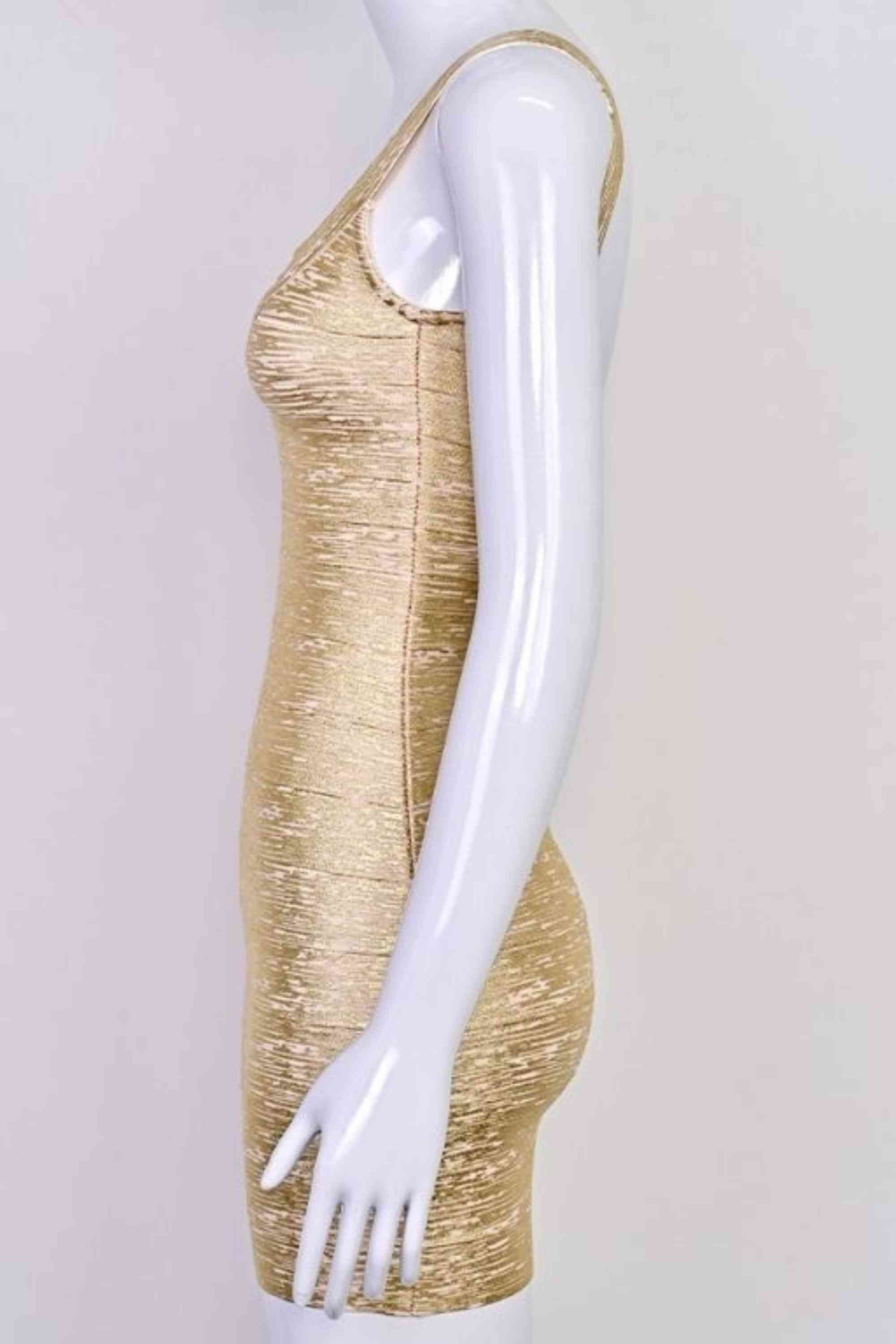 Woman wearing a figure flattering Cindy Bandage Mini Dress - Gold BODYCON COLLECTION Pty Ltd