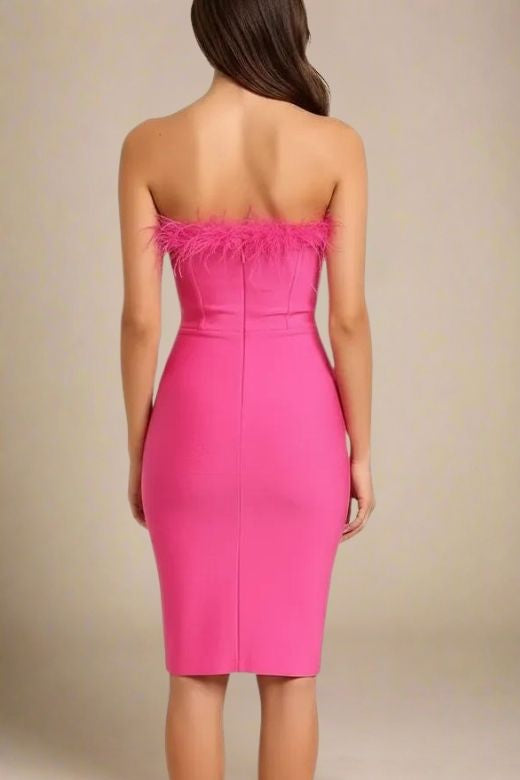 Woman wearing a figure flattering Erin Bandage Dress - Hot Pink BODYCON COLLECTION