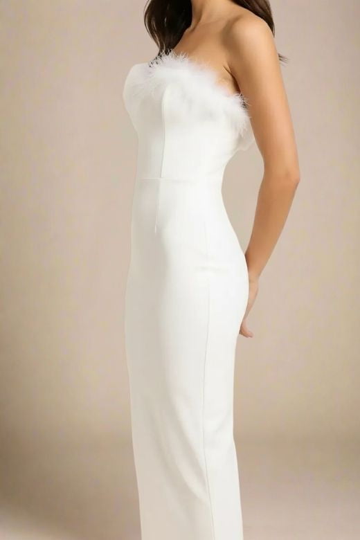 Woman wearing a figure flattering Erin Bandage Maxi Dress - White Pearl BODYCON COLLECTION