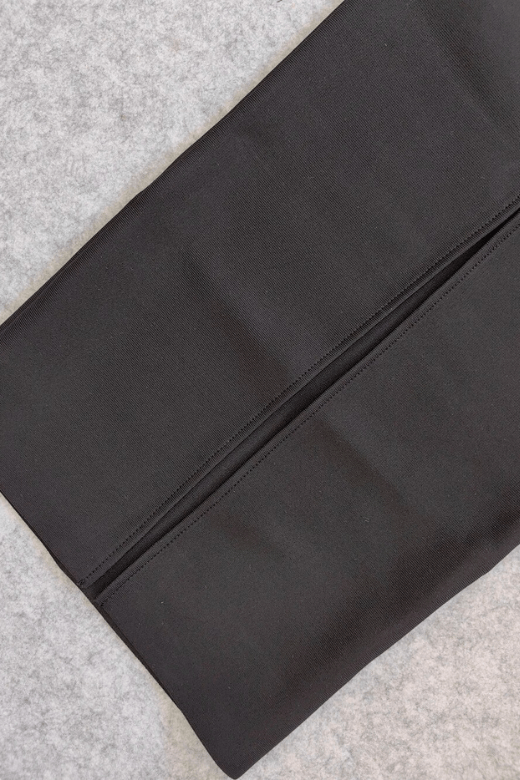 Woman wearing a figure flattering Erin Bodycon Maxi Dress - Classic Black BODYCON COLLECTION