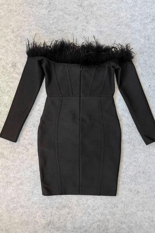 Woman wearing a figure flattering Erin Long Sleeve Off Shoulder Bodycon Mini Dress - Classic Black BODYCON COLLECTION