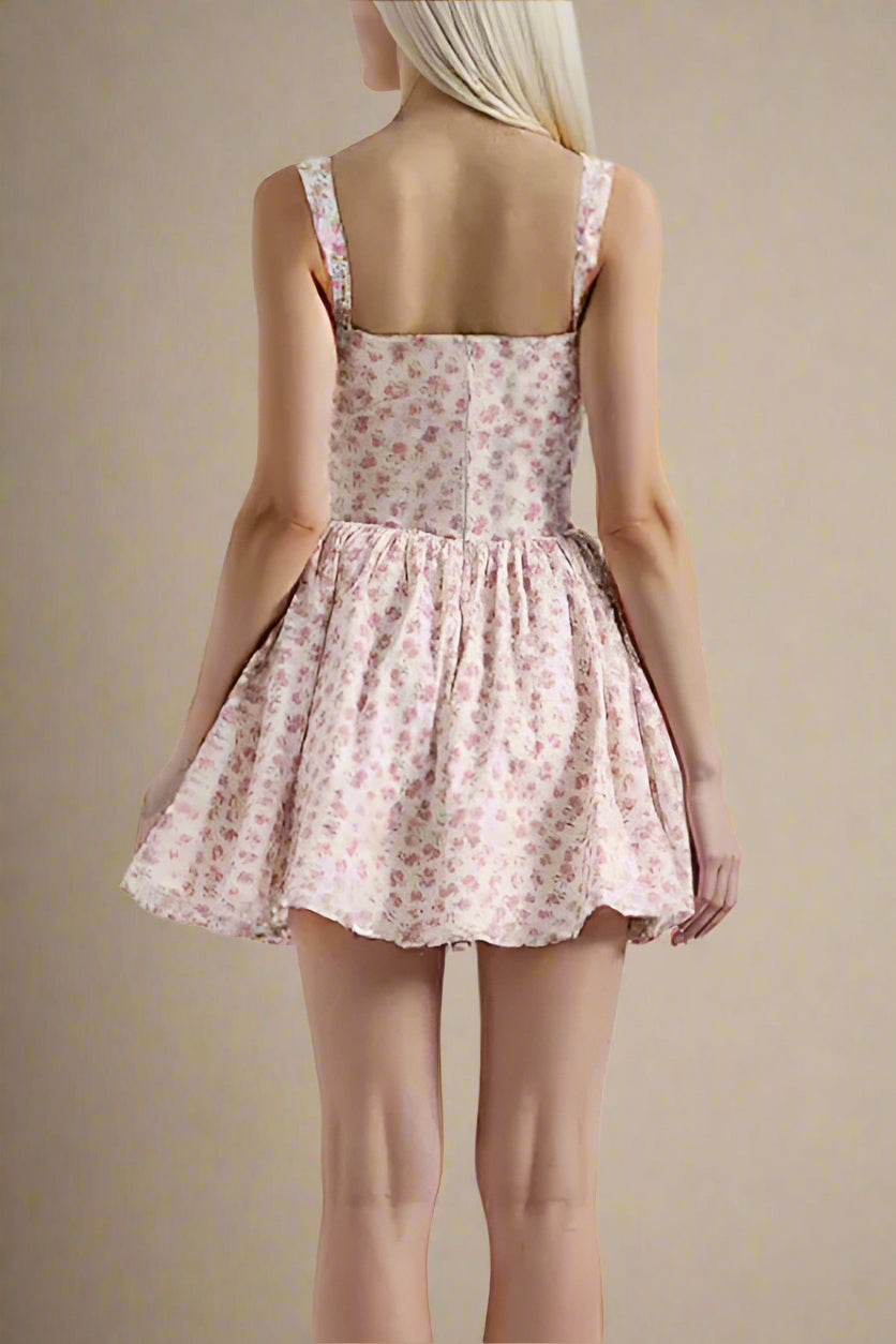 Woman wearing a figure flattering Estelle Bodycon Mini Dress - Blush Pink BODYCON COLLECTION Pty Ltd