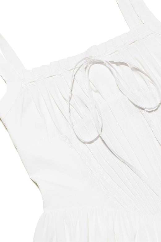 Woman wearing a figure flattering Estelle Bodycon Mini Dress - White Pearl BODYCON COLLECTION Pty Ltd