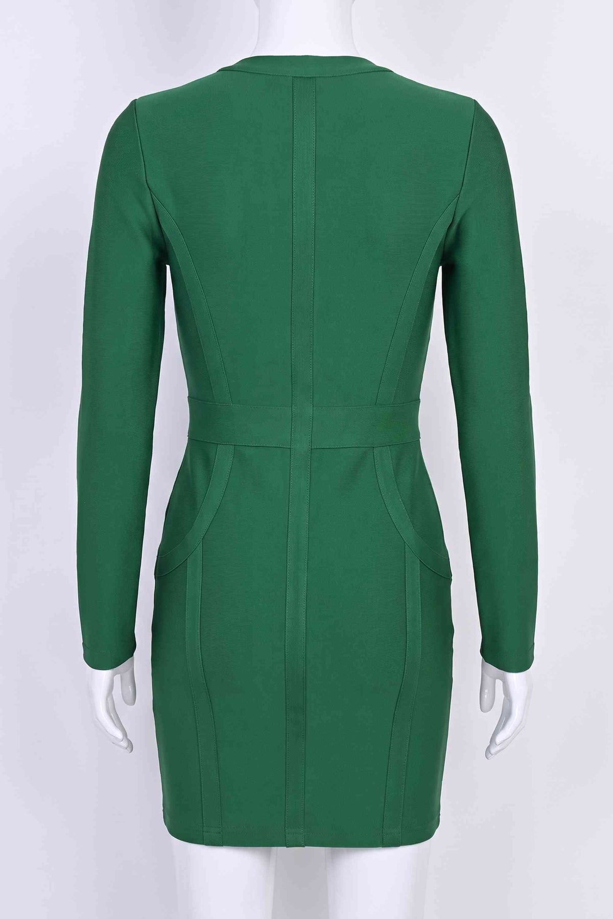 Woman wearing a figure flattering Eva Long Sleeve Bandage Mini Dress - Emerald Green BODYCON COLLECTION